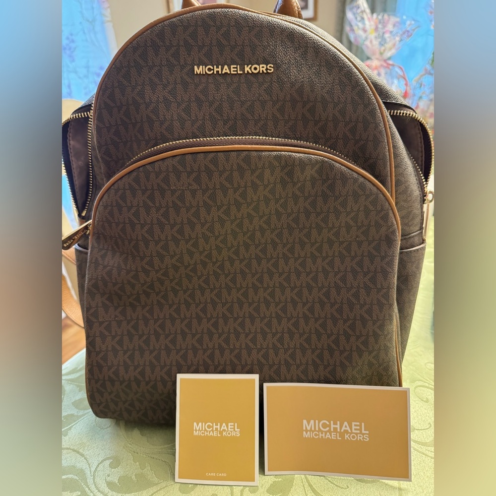 Michael Kors Brown Monogram Backpack with Gold Accents